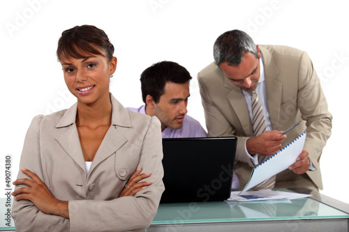 Photo: Business professionals working together on a project Business professionals working together on a project
