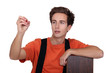 Worker with wooden flooring