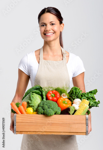 Photo: Smiling woman with fresh produce Smiling woman with fresh produce