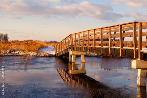 Photo: wooden bridge over river wooden bridge over river
