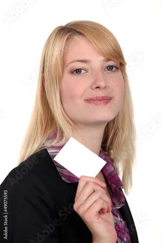Photo: Businesswoman with a blank business card Businesswoman with a blank business card