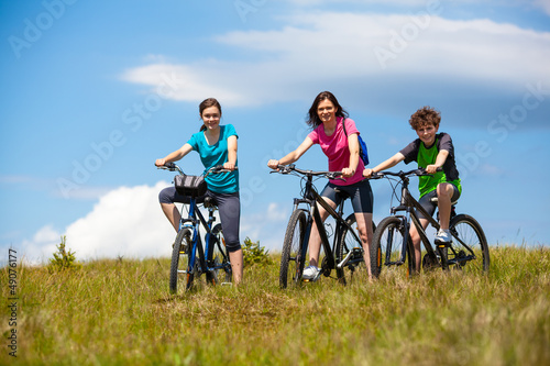 Photo: Active family biking Active family biking