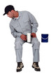 A male painter looking down.