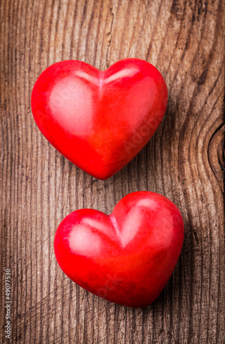 Photo: Red hearts on wood Red hearts on wood