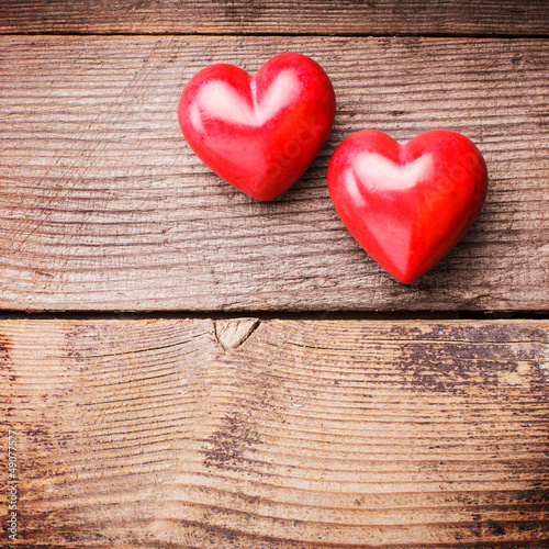 Photo: Red hearts on wood Red hearts on wood