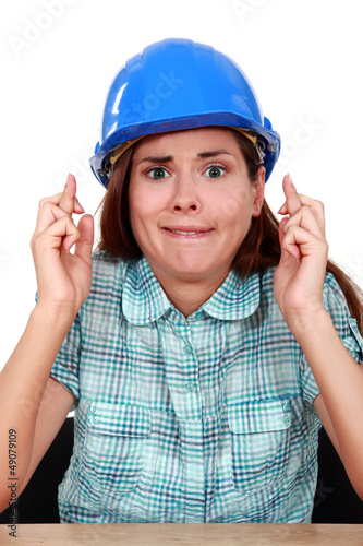 Photo: Woman with fingers crossed Woman with fingers crossed