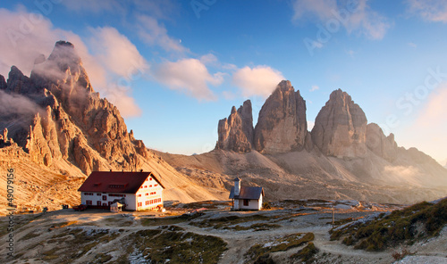 Photo: Dolomites mountain in Italy at sunset - Tre Cime di Lavaredo Dolomites mountain in Italy at sunset - Tre Cime di Lavaredo