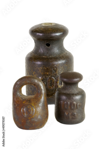 Photo: Three of the old weights for scales Three of the old weights for scales