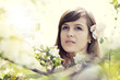 Young woman in the orchard