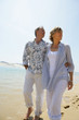 Couple walking on the beach