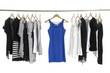 A row of summer clothes hanging on the rack