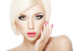 Foto: Beautiful woman with short Blond hair Beautiful woman with short Blond hair