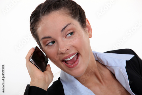 Photo: Excited brunette receiving good news Excited brunette receiving good news