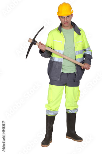 Photo: Scary builder holding axe Scary builder holding axe