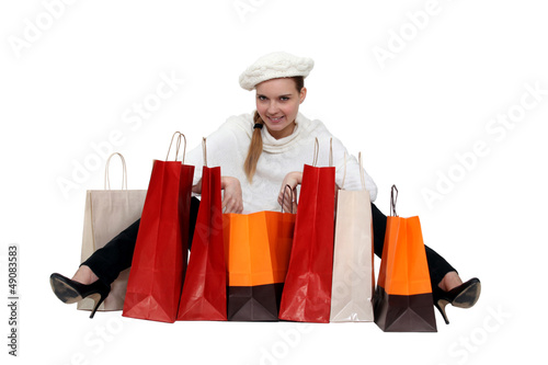Photo: Fashionable woman surrounded by her shopping bags Fashionable woman surrounded by her shopping bags