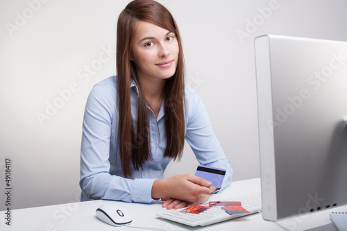 Photo: Young woman with credit cards Young woman with credit cards