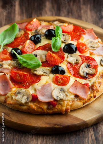 Photo: Pizza with mushrooms and olives Pizza with mushrooms and olives