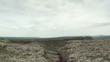 Video: Tourist climbing on a mountain and admiring the view Tourist climbing on a mountain and admiring the view