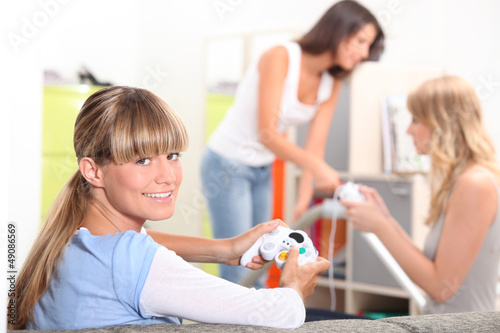 Photo: Girls playing computer games Girls playing computer games