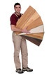Carpenter with an assortment of flooring