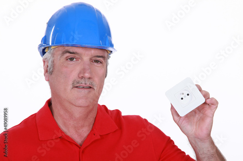 Photo: Builder with a continental power socket Builder with a continental power socket