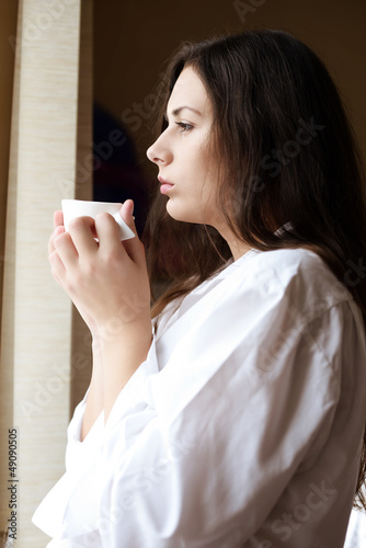 Photo: morning coffee near the window morning coffee near the window