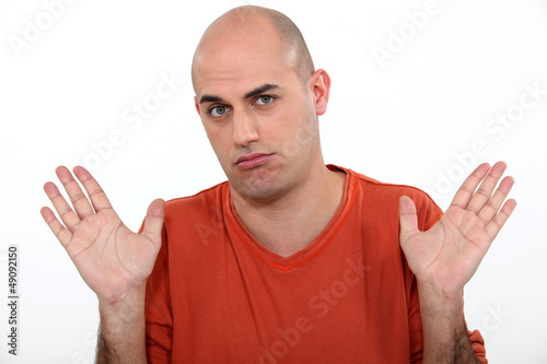 Photo: Casual bald man in studio Casual bald man in studio