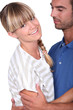 Happy young couple holding each other