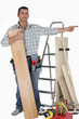Carpenter pointing at empty copy space