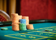 Photo: Close up of piles of chips on the roulette table Close up of piles of chips on the roulette table
