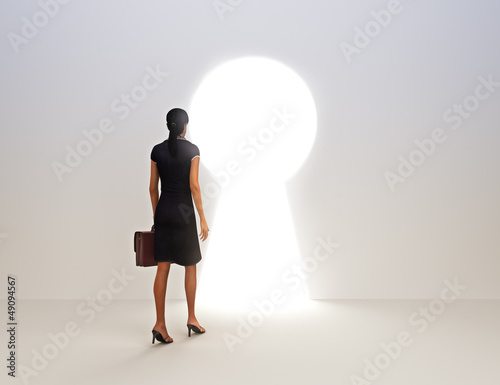 Illustration: Business female key to success concept Business female key to success concept