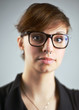 Woman with Piercing and Nerd Glasses