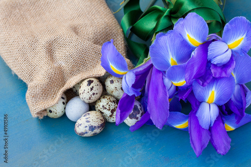 Photo: quail eggs in sack and irises quail eggs in sack and irises