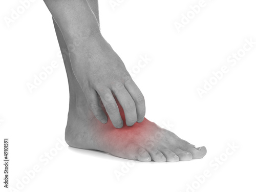 Photo: Women scratch itchy leg with hand. Women scratch itchy leg with hand.