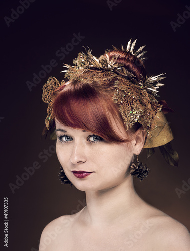 Photo: Beauty portrait of red Hair female with luxurious Hair Style mak Beauty portrait of red Hair female with luxurious Hair Style mak