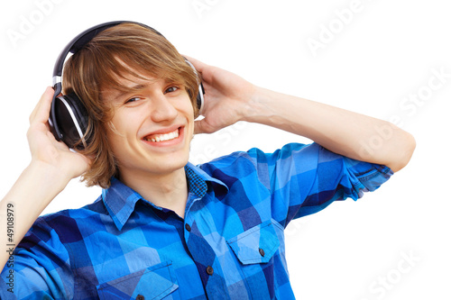 Photo: Happy smiling young man dancing Happy smiling young man dancing