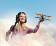 Little girl in pilot's hat