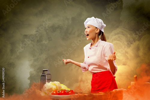 Photo: Asian female cook in anger Asian female cook in anger