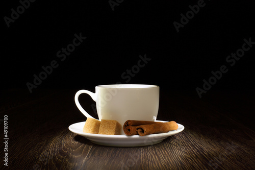 Photo: Coffee beans and white cup Coffee beans and white cup