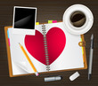 open diary with a heart
