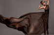 beautiful woman in brown dress