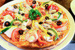 close up of homemade seafood pizza, partial view