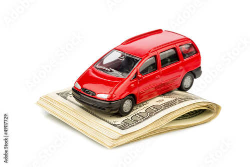 Photo: Auto auf Dollar Geldscheinen Auto auf Dollar Geldscheinen