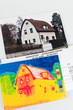 Energie sparen. Haus mit Wärmebild Kamera