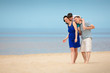 Photo: Family of three having fun on tropical beach Family of three having fun on tropical beach