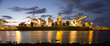 Cargo ship in port at dusk