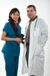 Photo: Attractive multi ethnicity medical professional man woman team Attractive multi ethnicity medical professional man woman team