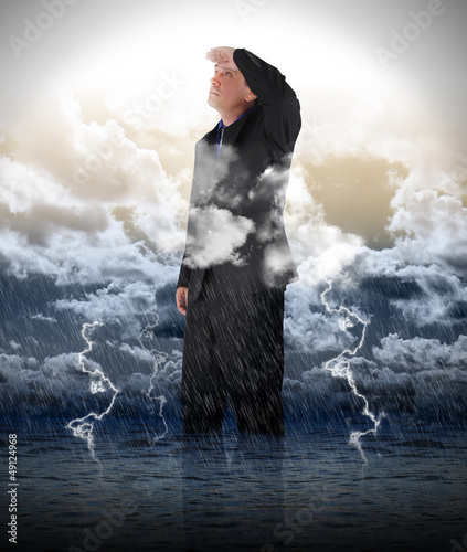 Photo: Optimistic Business Man in Storm Water Optimistic Business Man in Storm Water