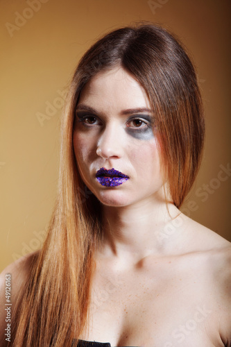 Photo: portrait of young beautiful woman creative make up portrait of young beautiful woman creative make up