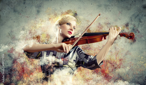 Photo: Gorgeous woman playing on violin Gorgeous woman playing on violin
